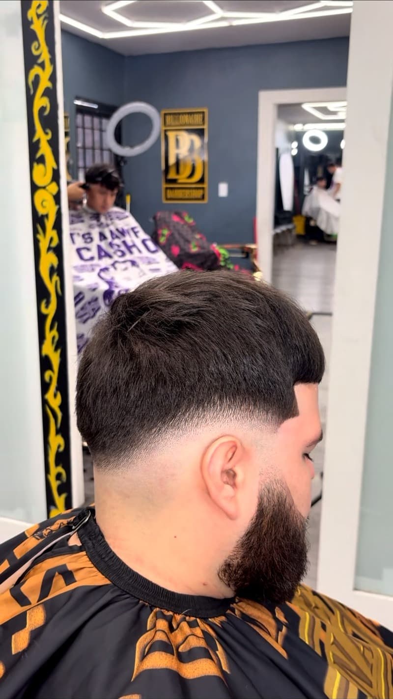 Mid fade with beard — BB logo mirror and cape