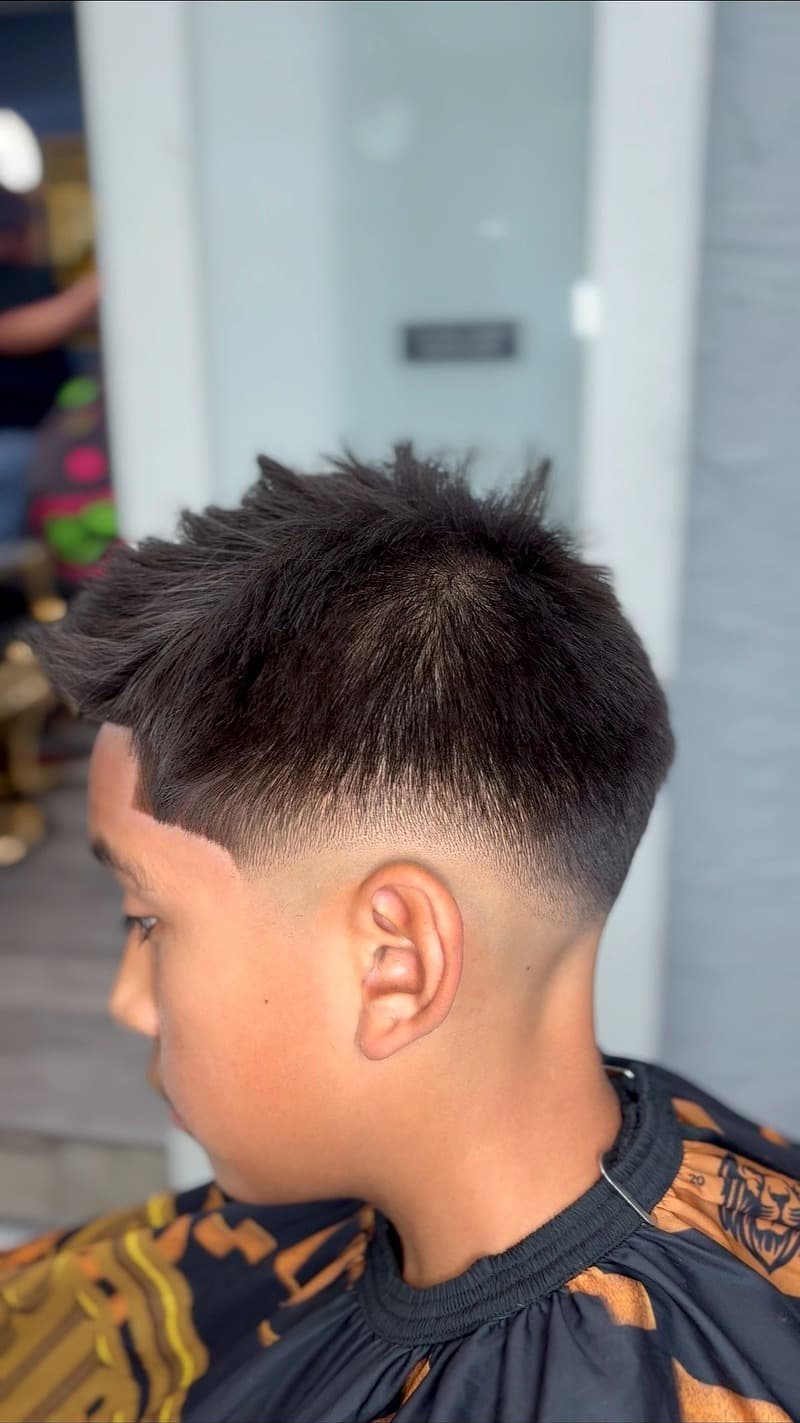 Kids burst fade with textured top — clean lineup